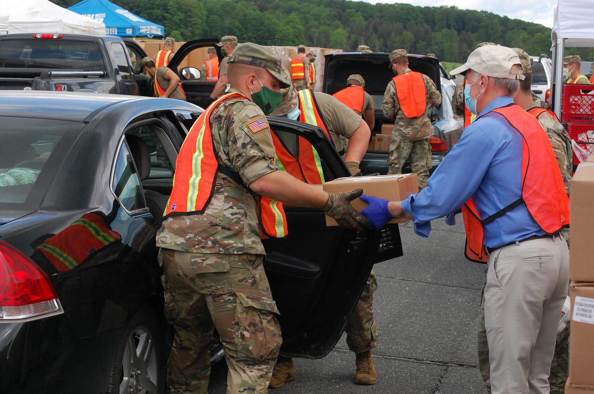 Throngs Turn Out At Caledonia Airport For Food Distribution